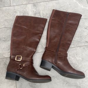 Tall brown boots with rose gold hardware